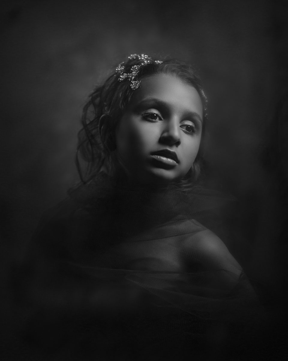 Tintype inspired black and white photo of a child by Melbourne portrait photographer Rocco Ancora
