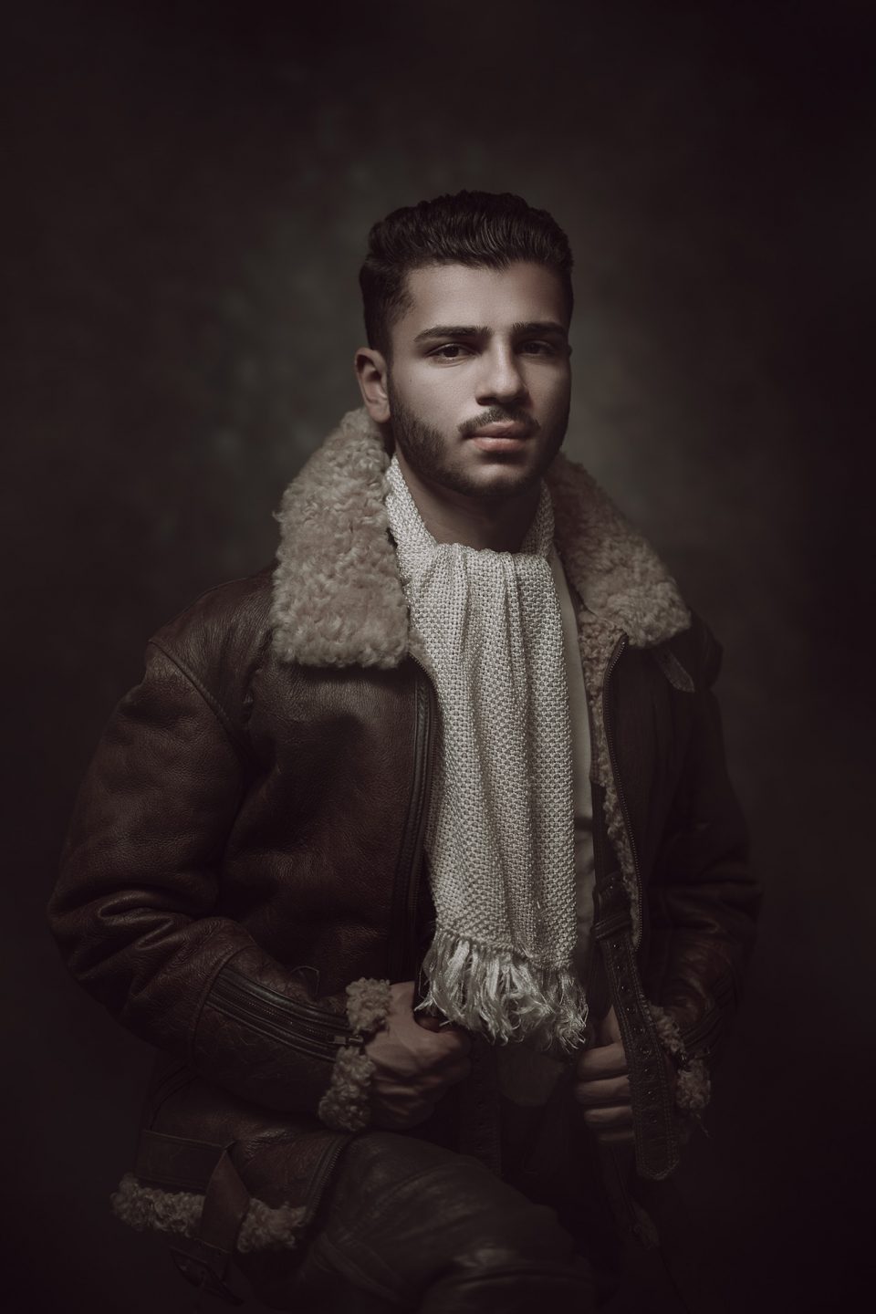 Photograph ‘The Aviator’ taken by Melbourne photographer. Subject is wearing genuine WW2 Airforce attire, leather jacket and woven cream scarf
