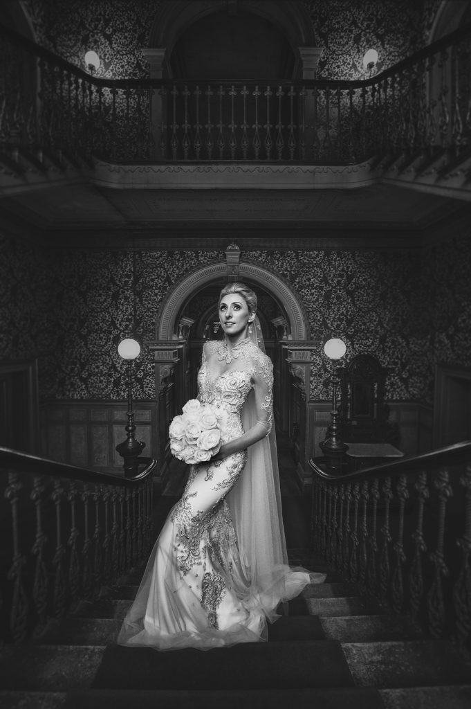 Wedding photo of bride on Labassa Mansion staircase