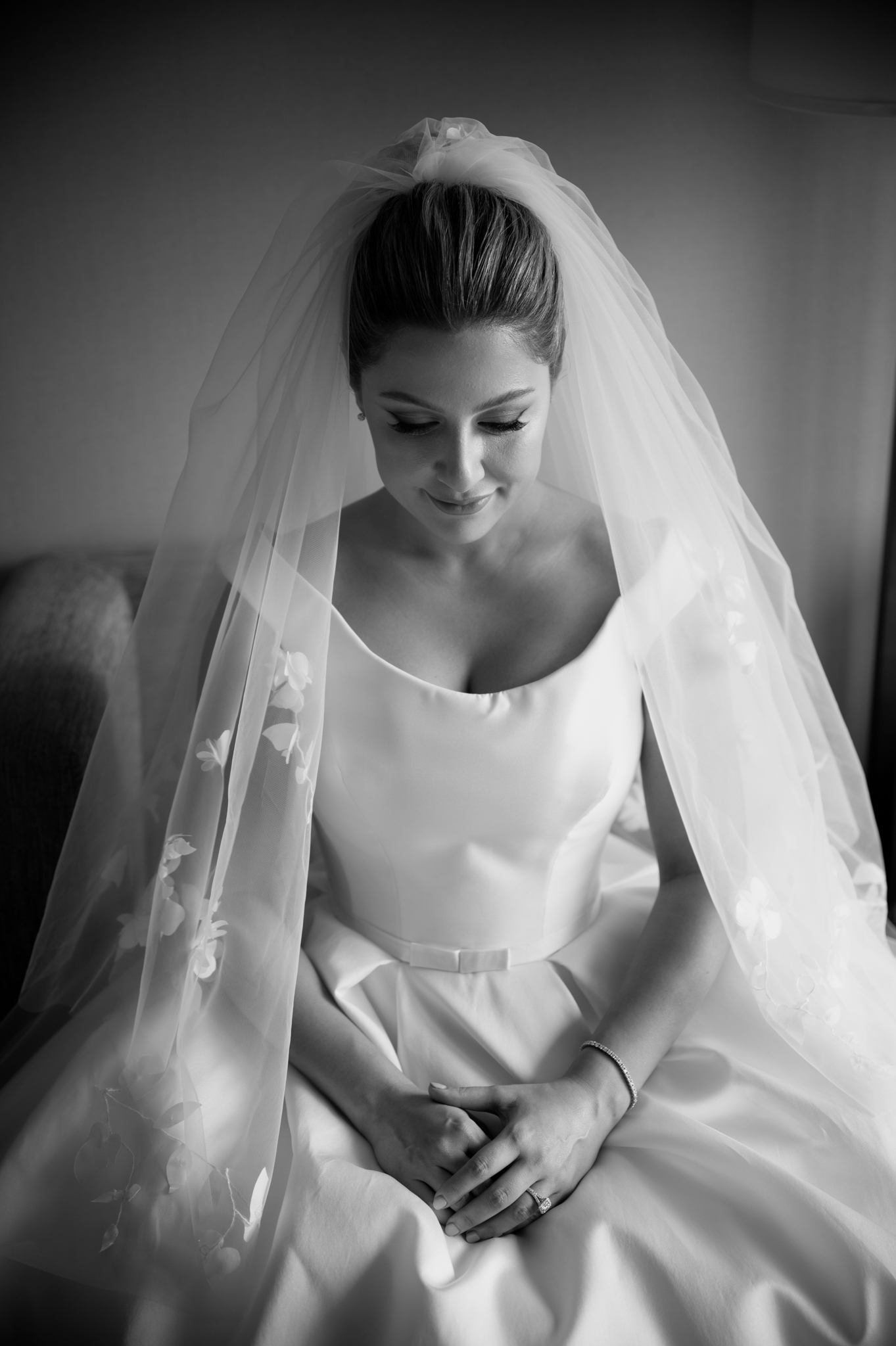 bride wearing veil over bun