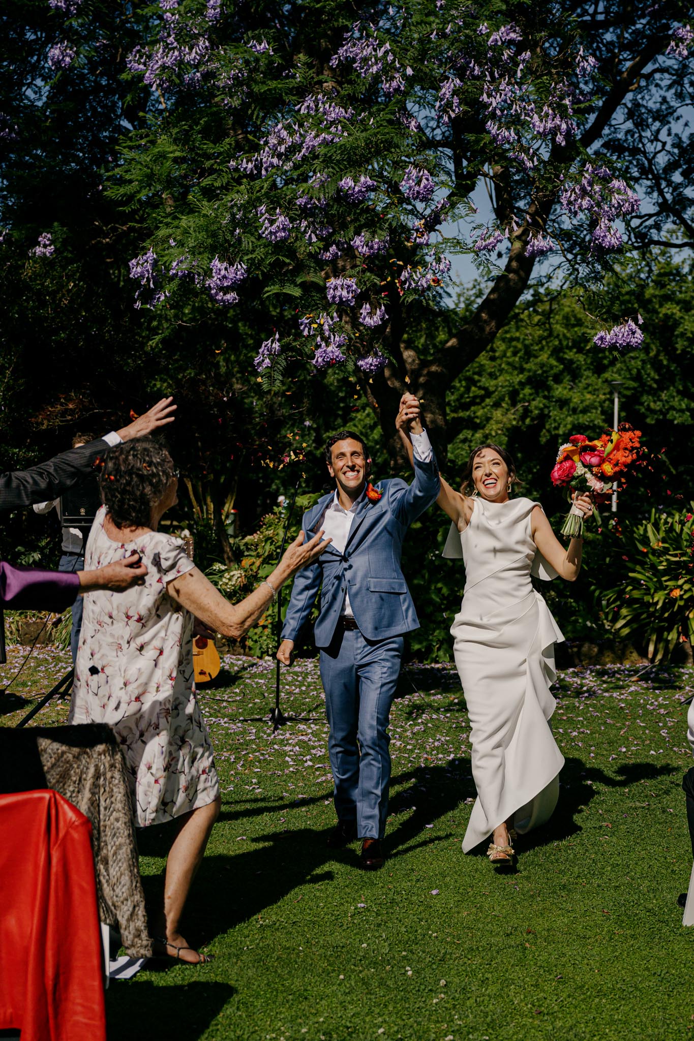 couple just married in garden candid wedding photography