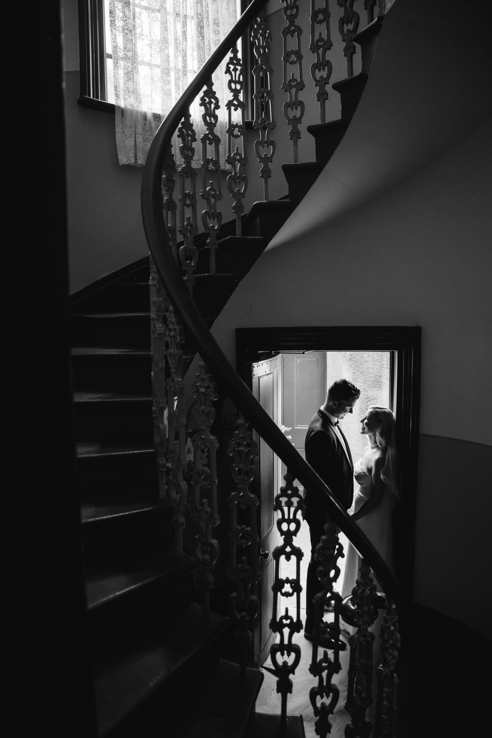 Wedding couple on Staircase at Overnewton Castle in Keilor, Melbourne
