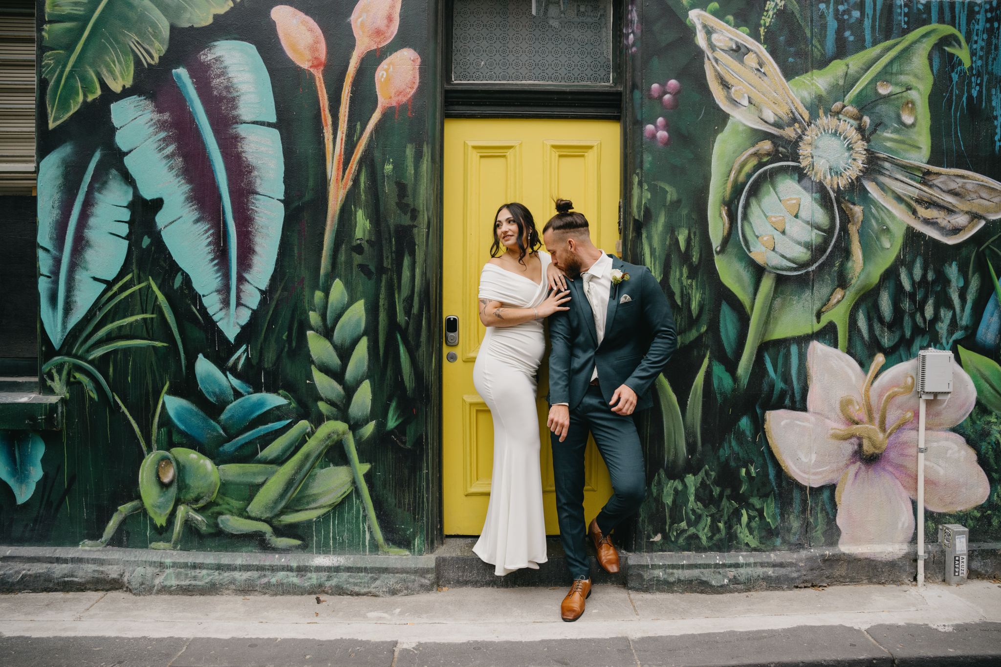 Bride and Groom in graffitied laneway, Melbourne