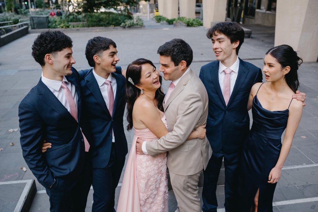 Bride and groom with children during Melbourne city wedding