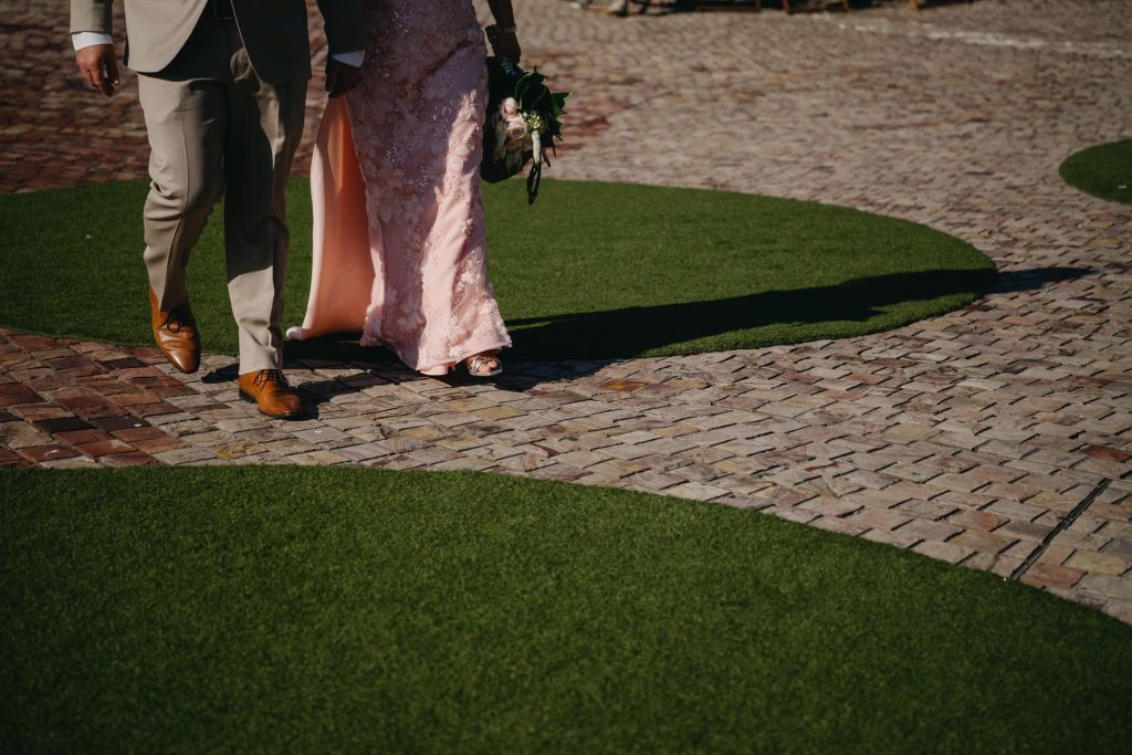 Bride and groom walking into Taxi Kitchen wedding venue at Federation Square