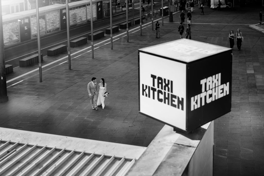 Black and white Federation Square portrait outside Taxi Kitchen Melbourne