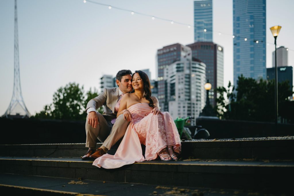 Evening wedding portraits with Melbourne skyline near Federation Square