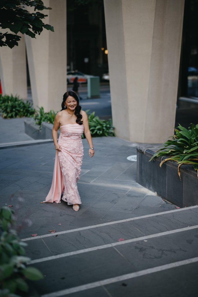 Bride arriving for relaxed city portraits before Transport Hotel wedding Melbourne