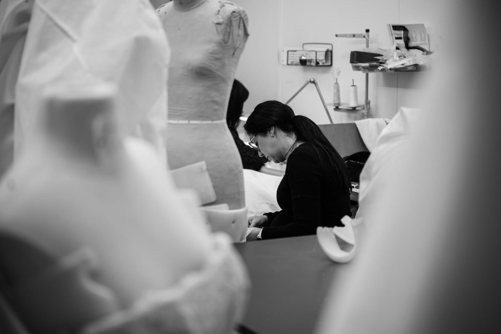 Seamstresses handcrafting couture wedding gowns inside the Annette of Melbourne atelier