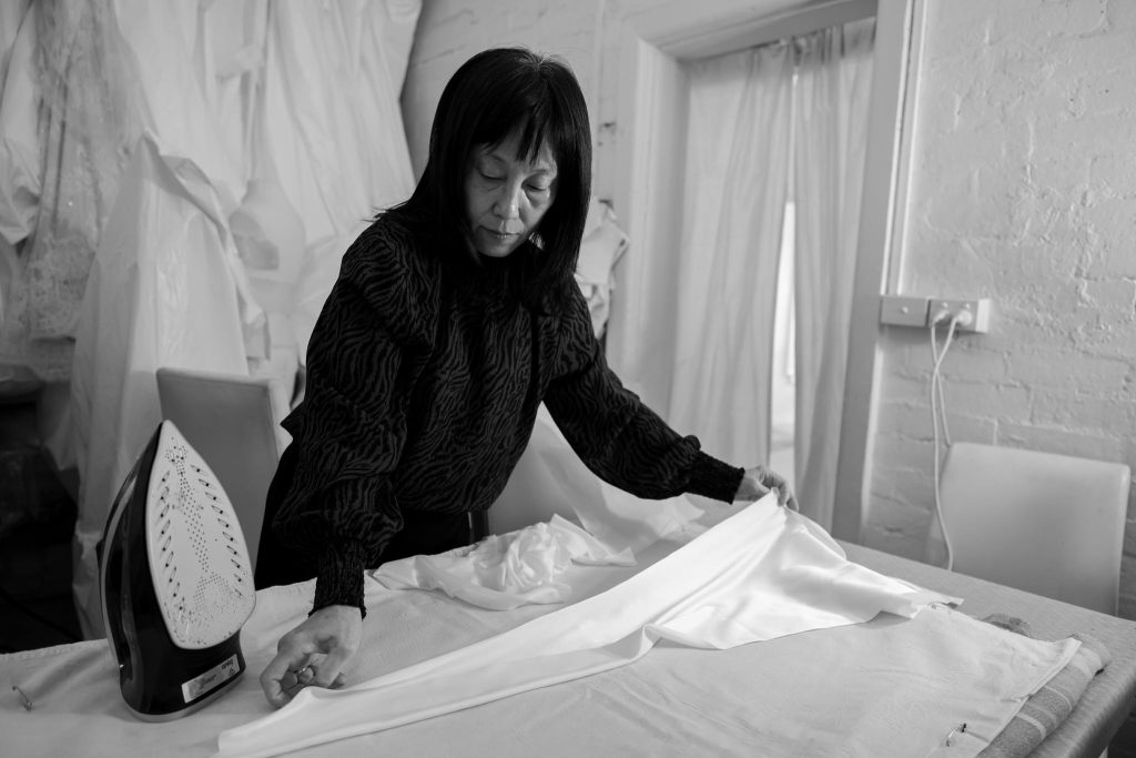 Seamstresses handcrafting couture wedding gowns inside the Annette of Melbourne atelier