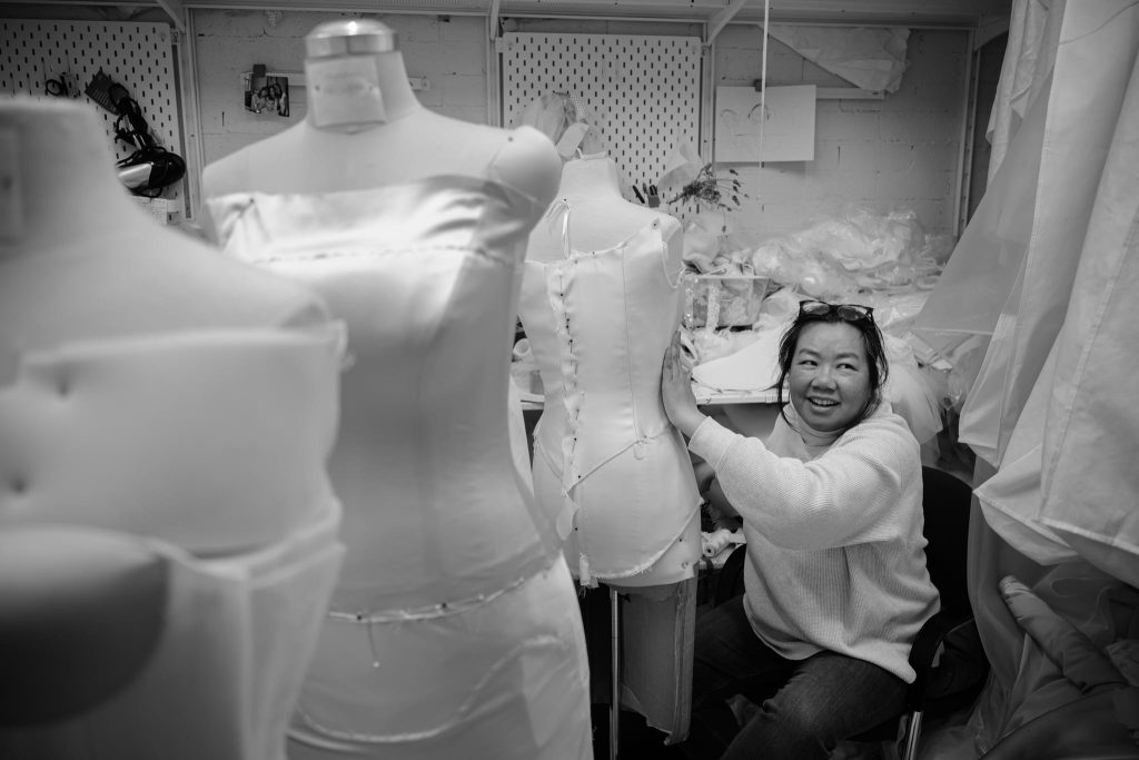 Seamstresses handcrafting couture wedding gowns inside the Annette of Melbourne atelier