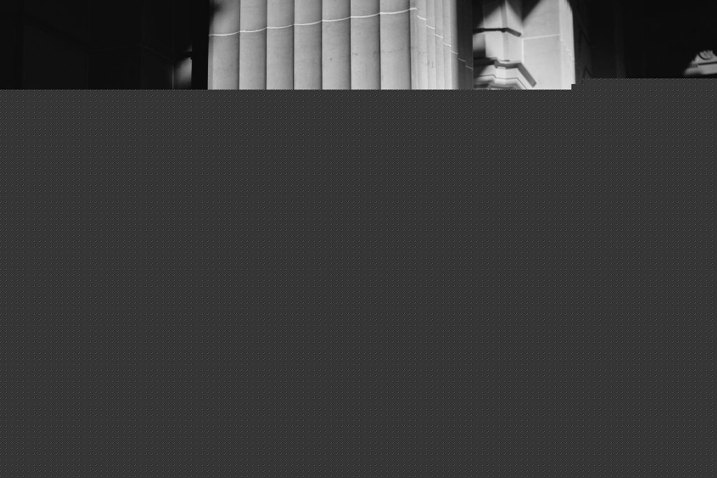 Black and white photo of couple ate parliament house Melbourne