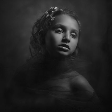 Tintype inspired black and white photo of a child by Melbourne portrait photographer Rocco Ancora